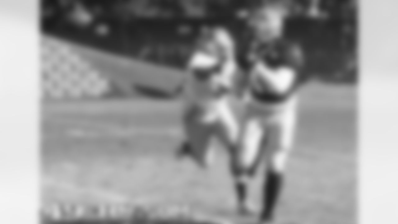 LB Mike Balogun covers FB Jehuu Caulcrick