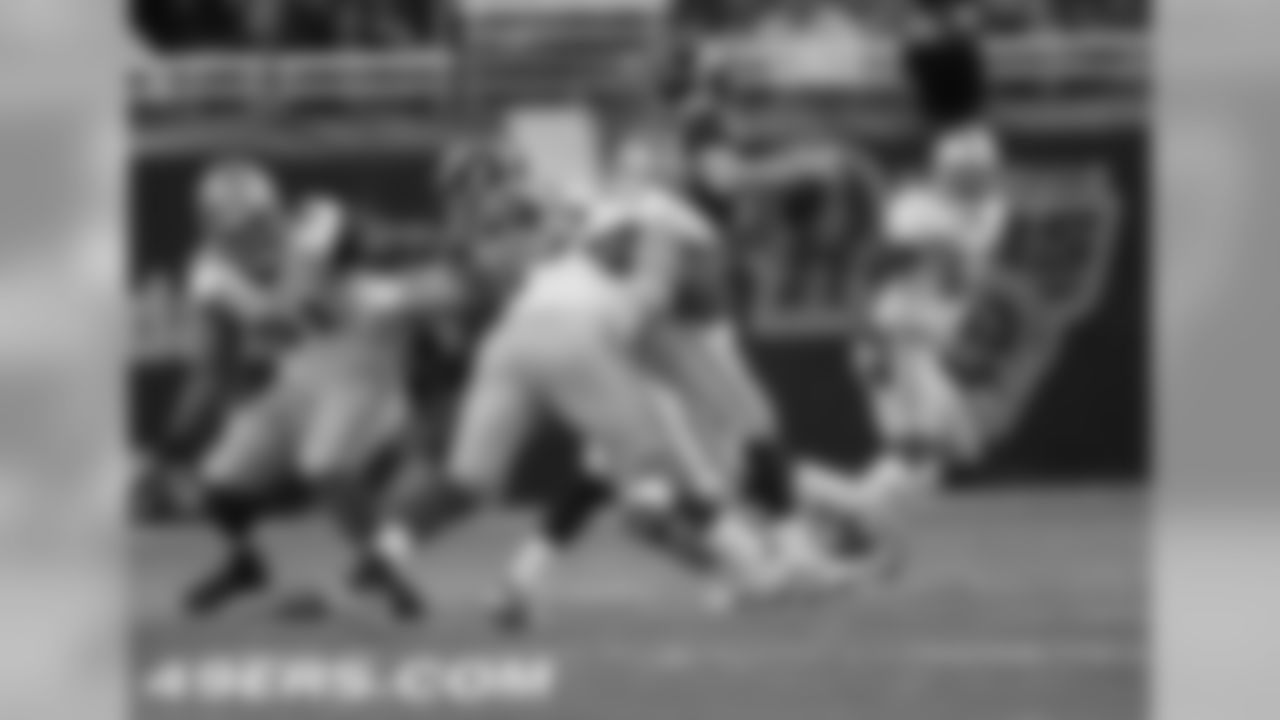 Smith with one of his 3.5 sacks on the day