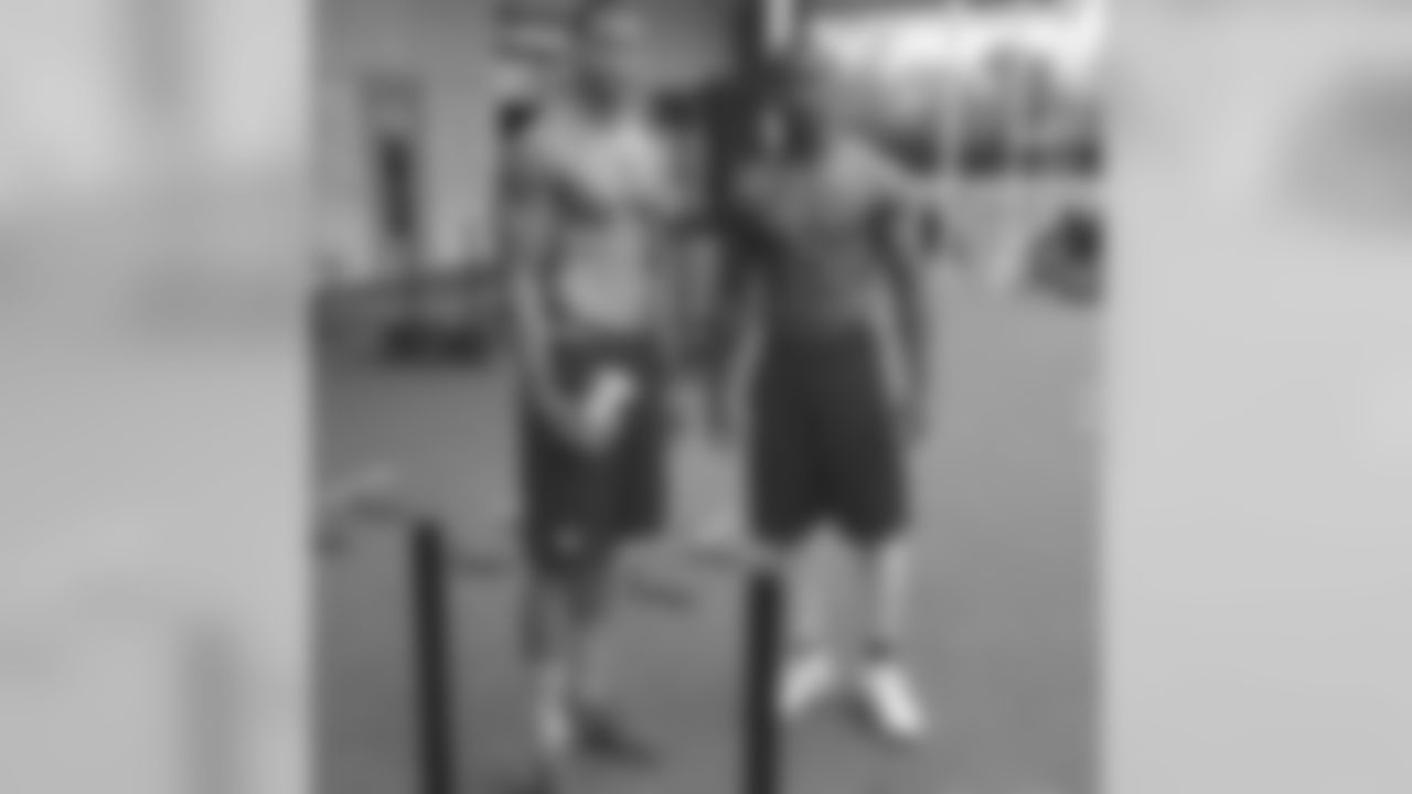 Colin Kaepernick poses for a picture during a workout with current Buffalo Bills QB Tyrod Taylor.