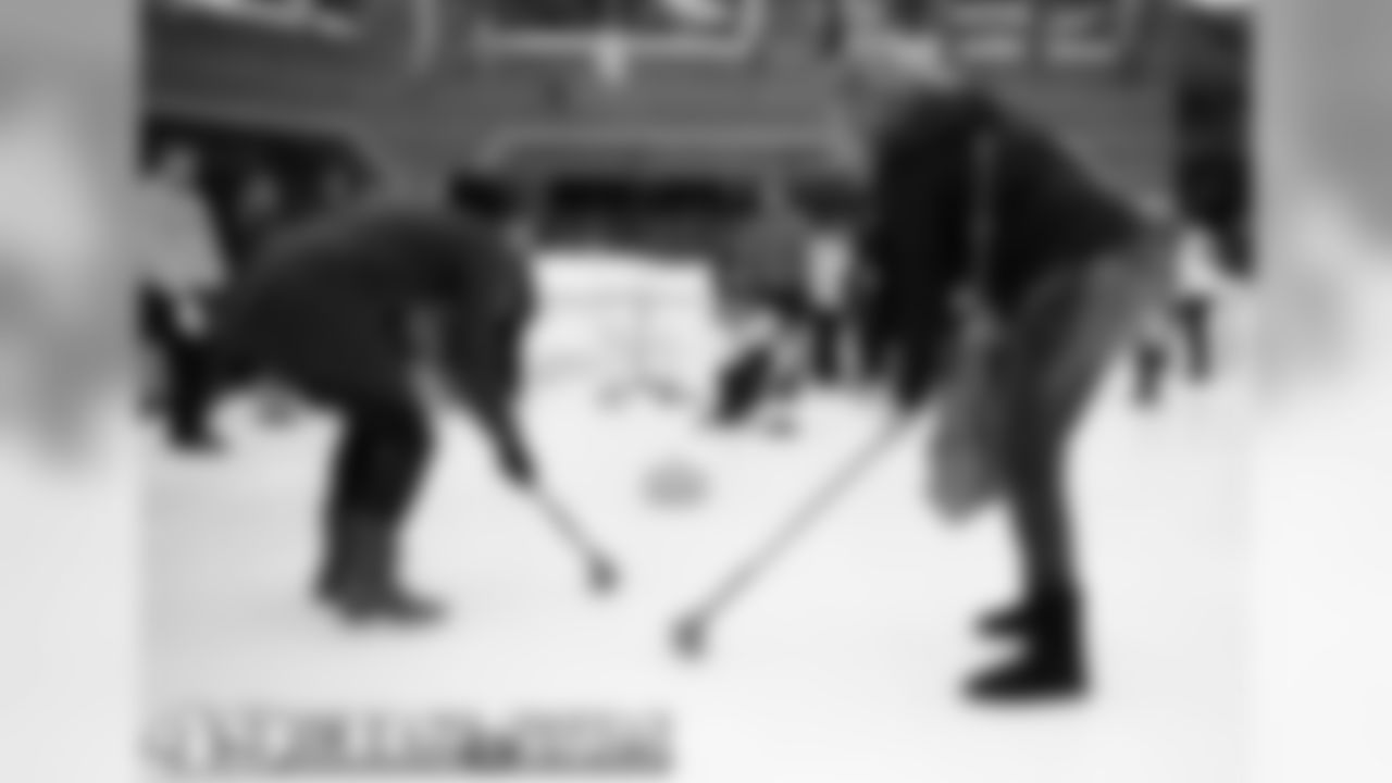 Guests enjoy curling instruction from US Curling Team members