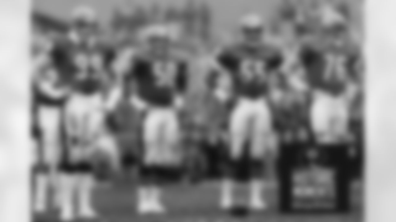 With a defiant hands-on-hips posture, Bear defenders Dan Hampton [left to right], Mike Singletary, Otis Wilson and Steve McMichael wait for more action against the Redskins Dec. 31, 1984. Bears Historic Moments - Chicago Tribune