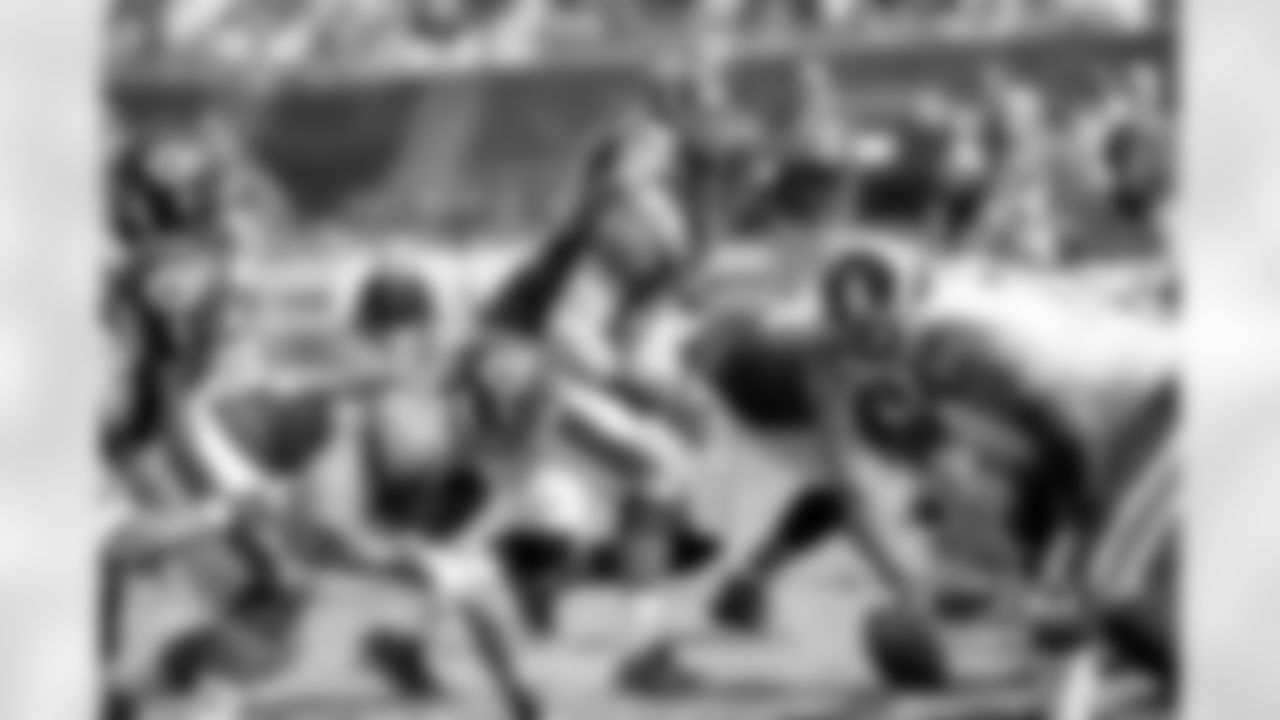 MLB Brian Urlacher and the Bears defense look to blow up the Rams offensive line.