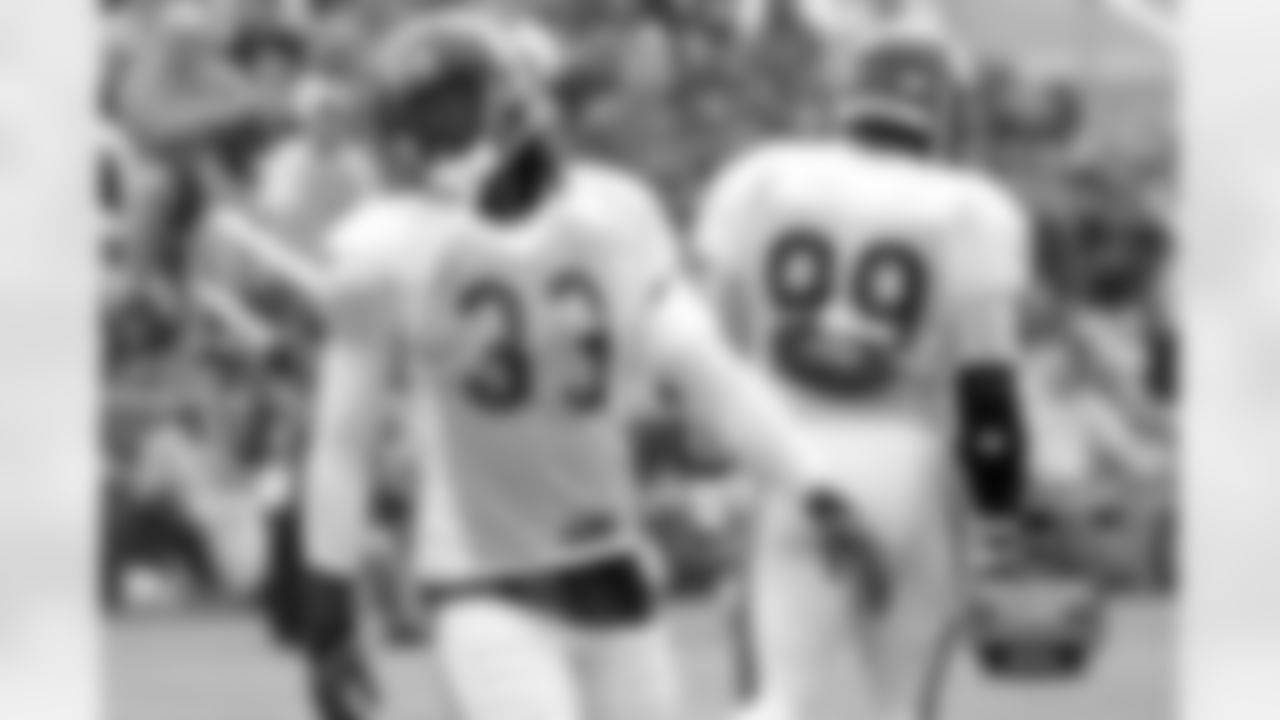 CB Charles Tillman, DE Lamarr Houston