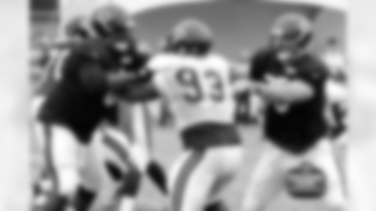 RT Jordan Mills and RG Kyle Long team up to keep DT Nate Collins out of the backfield.