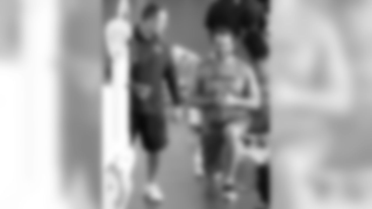 Strength & Conditioning Coordinator Mike Clark with DE Jared Allen