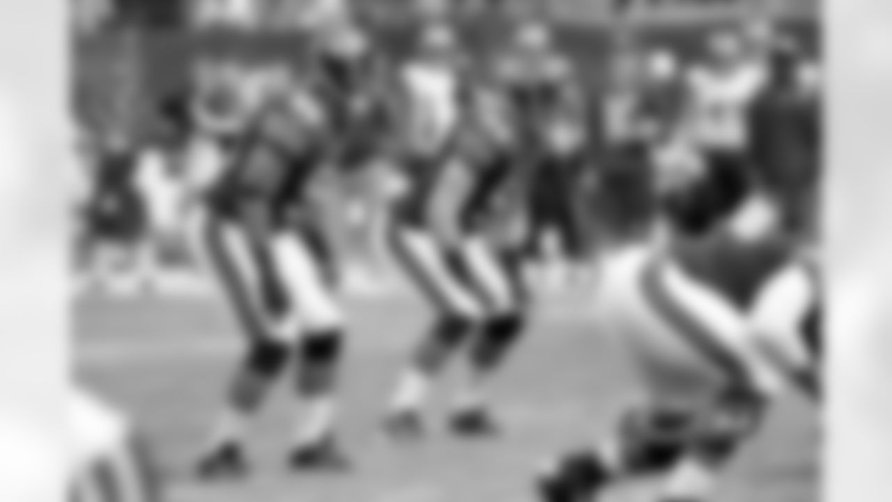 LB Lance Briggs and MLB Brian Urlacher stare down the Rams offense on their opening drive.