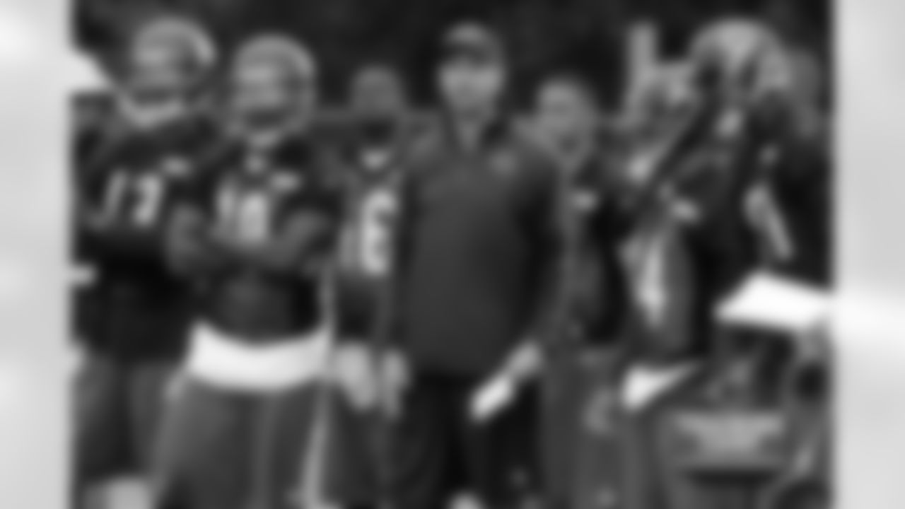 Wide Receivers Coach Mike Groh surrounded by #13 Devin Aromashodu, #19 Joe Anderson, #16 Jerrell Jackson, #14 Eric Weems and #81 Terrence Toliver