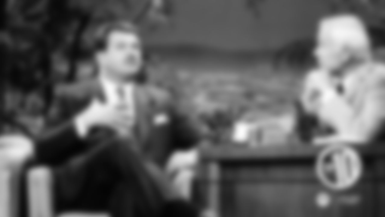 (8) Seeing himself in a monitor during an appearance on "The Tonight Show" with Johnny Carson, Da Coach joins the rest of humankind by admiring his spectacular mustache.