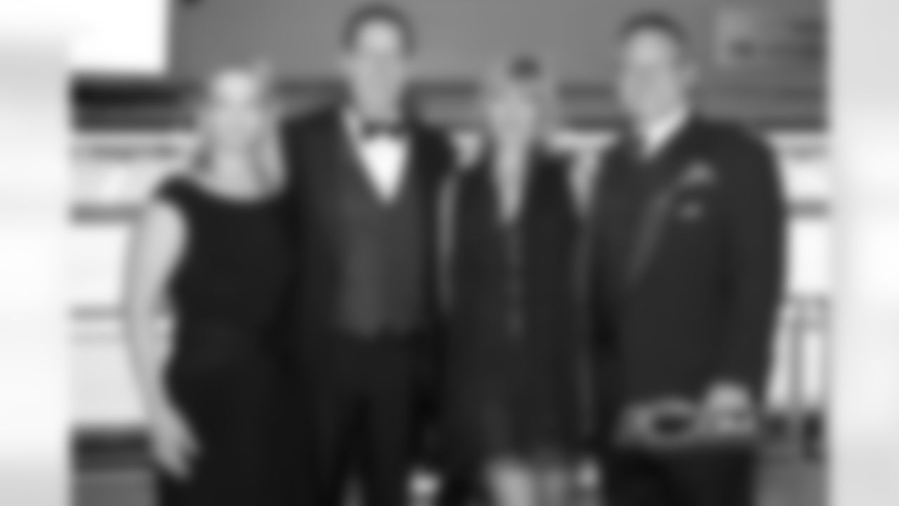 Emcee Jeff Joniak with wife, Candi and Gala guests.