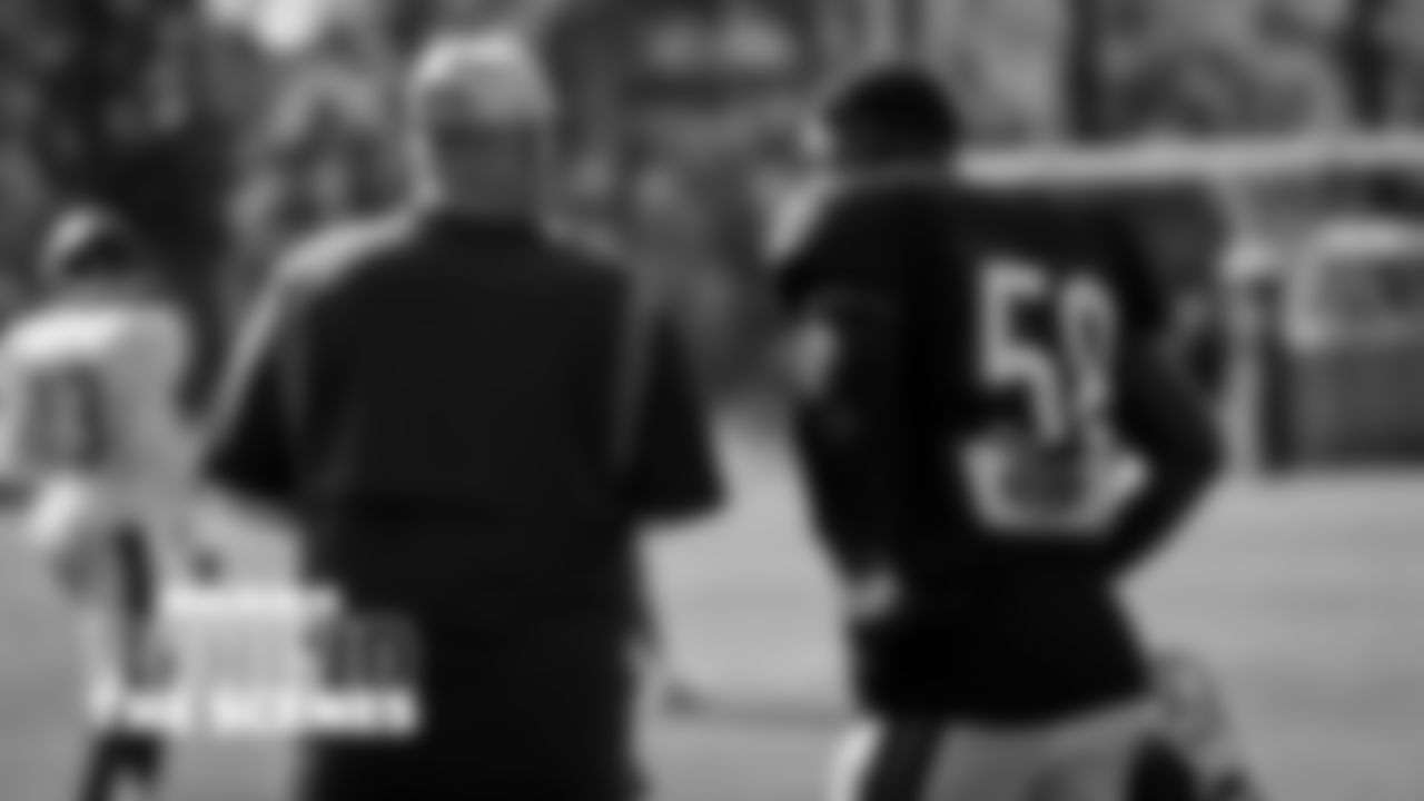 9:50 a.m. | Chatting with inside linebackers coach Bill McGovern