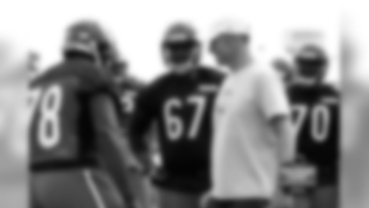 Tackles James Brown, Jordan Mills talk with OC Aaron Kromer.