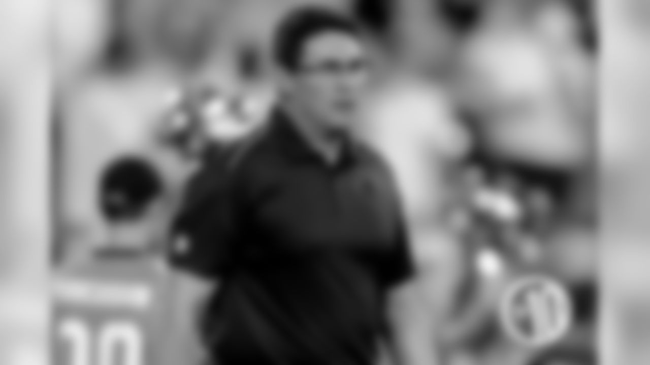 Bears playing career: Linebacker from 1984-1992, started 56 games during that span.Coaching record: 27-25 (.519) for the Carolina Panthers from 2011 through the present.