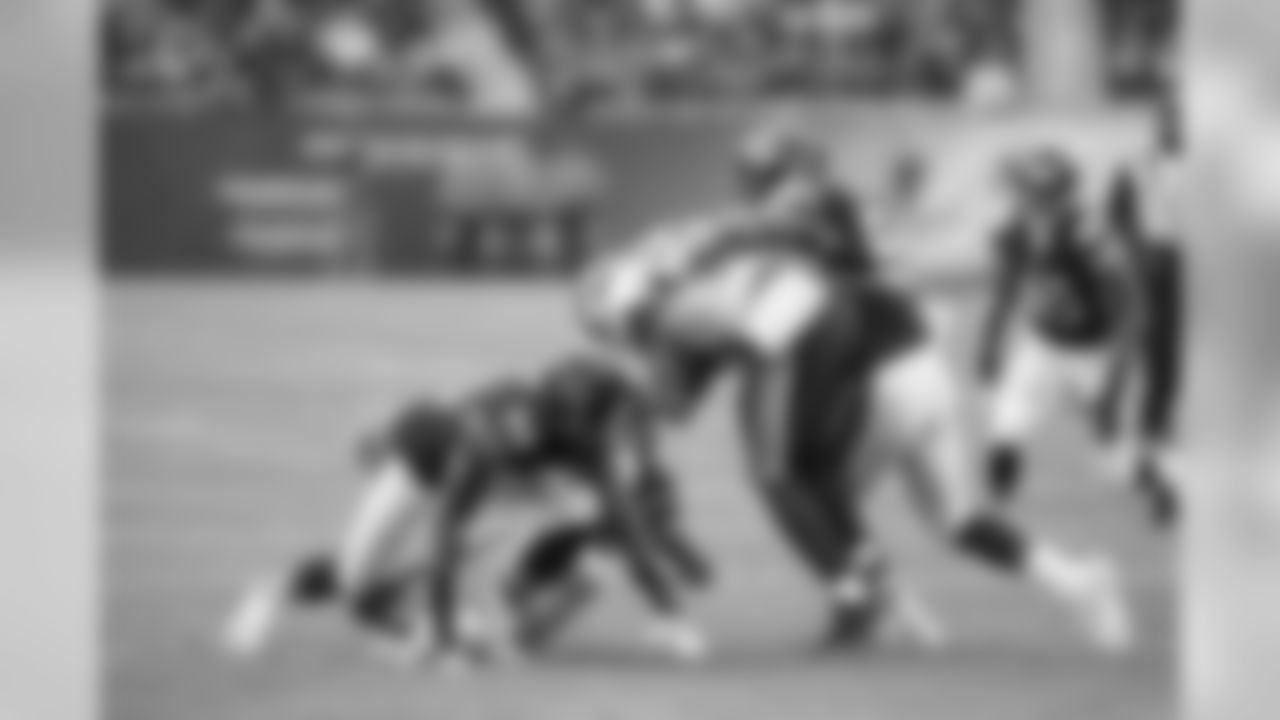 Chicago Bears LB Jon Bostic tackles Vikings WR Charles Johnson.