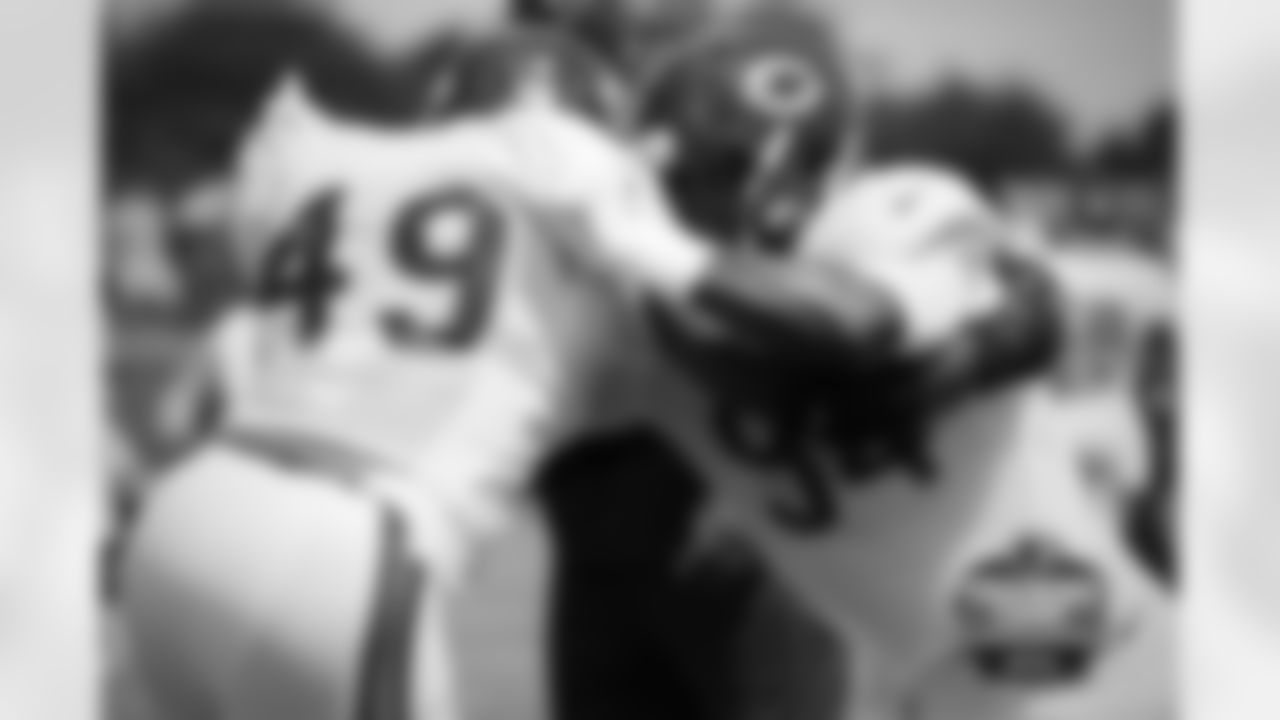 LB Sam Acho (49) and LB Leonard Floyd (94).
