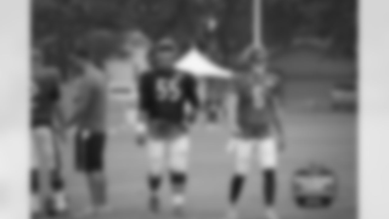 OL Hroniss Grasu (55) and QB Jay Cutler (6).