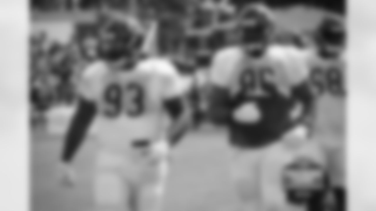 DL Will Sutton (93) and DL Akiem Hicks (96).