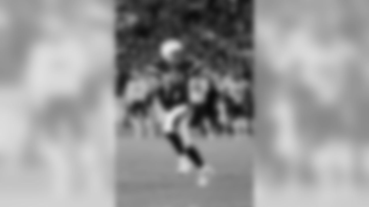 San Diego Chargers quarterback Philip Rivers scrambles