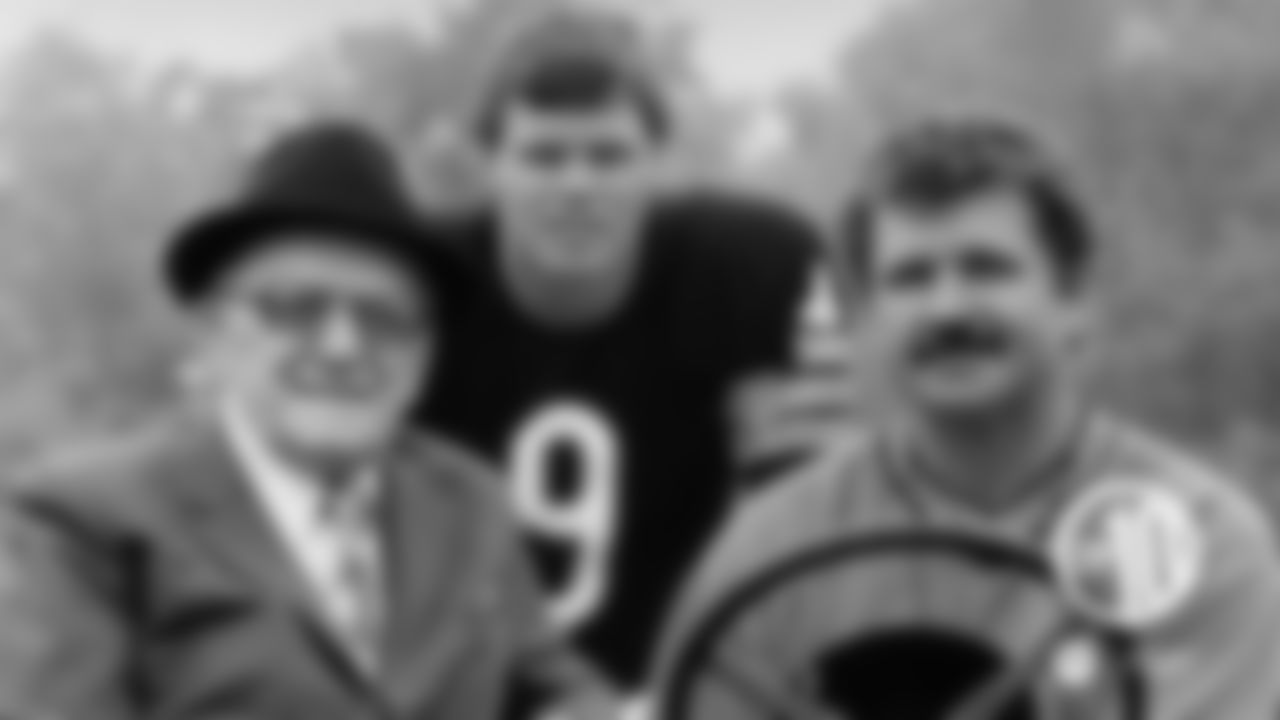 (10) Mike Ditka poses with three Bears icons: Papa Bear Halas, the punky QB known as McMahon and Da Coach's iconic mustache.