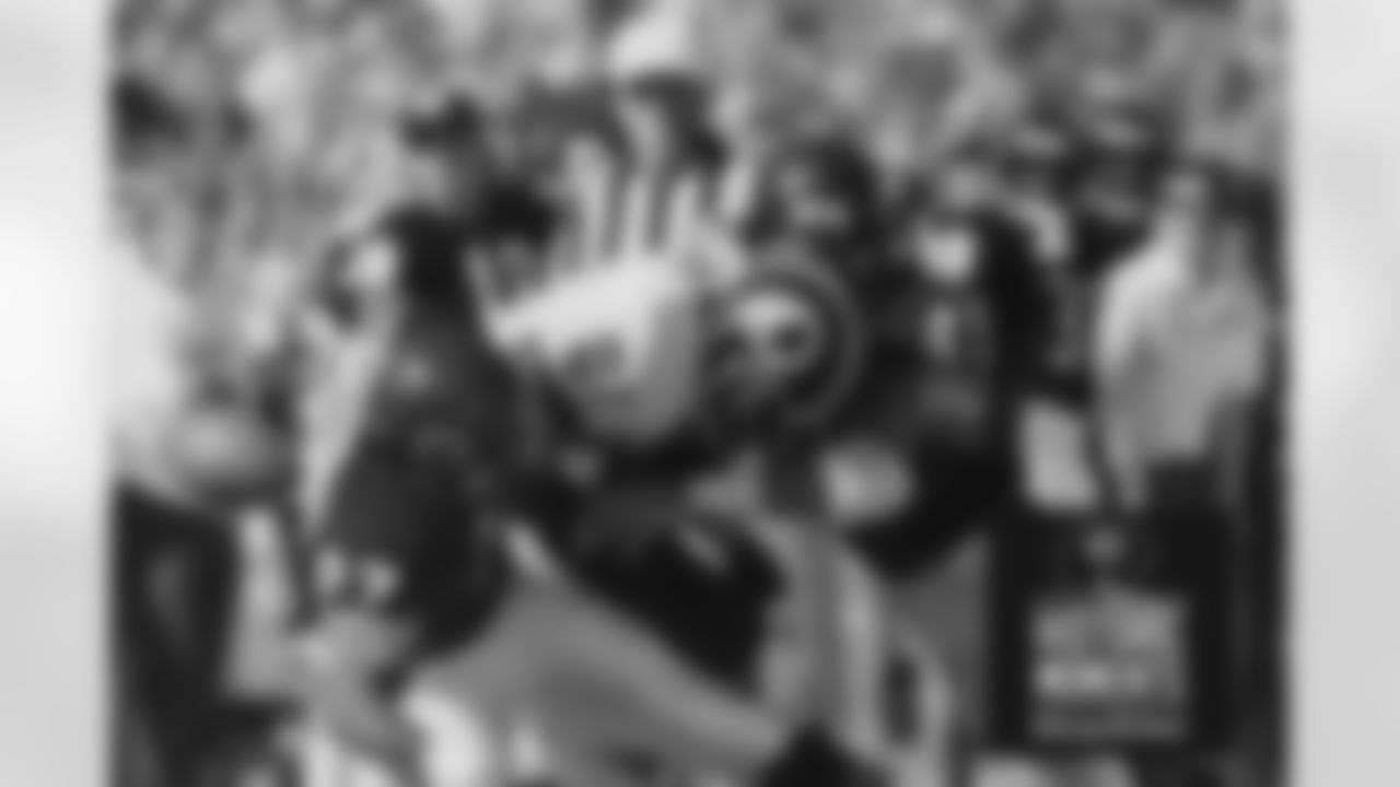 Gary Fencik [right] and Mike Richardson nail the Redskins' Art Monk, knocking the ball loose. Fencik says, "They call me Hit Man." Bears Historic Moments - Chicago Tribune