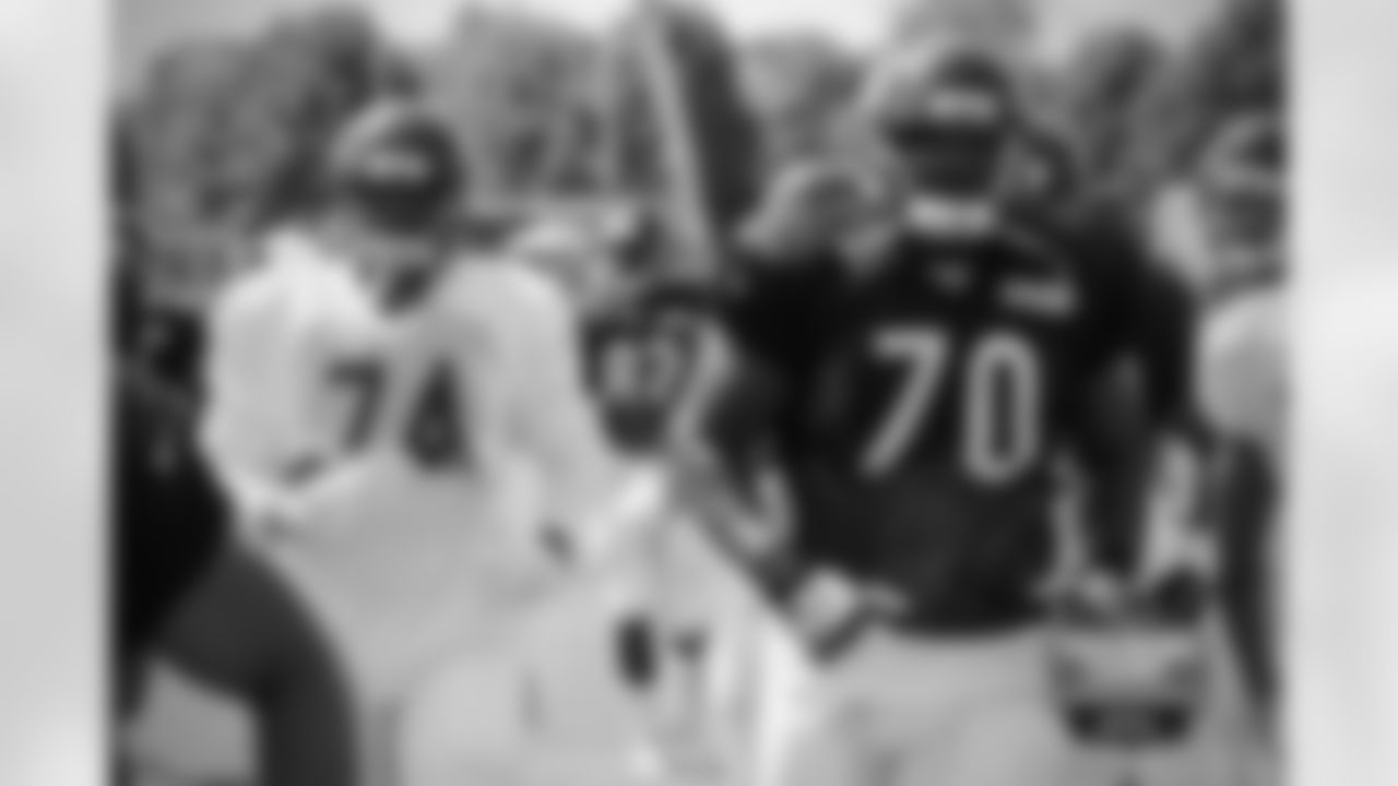 DL Jonathan Bullard (74) and OL Bobby Massie (70).