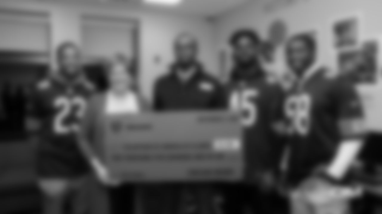 Members of the Chicago Bears visit with veterans at Hope Manor, Monday, November 5, 2018, in Chicago, Illinois.