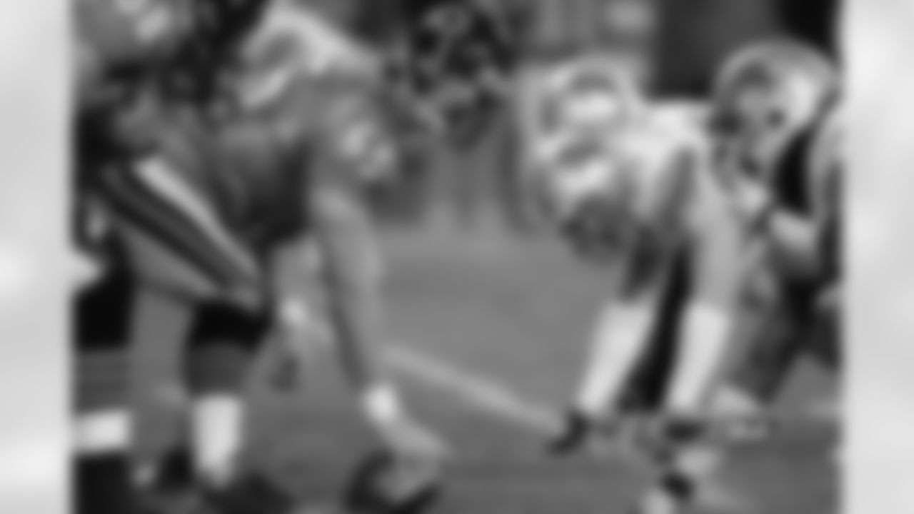 Patrick Mannelly #65 of the Chicago Bears gets ready to snap the football at the line of scrimmage during the game against the Detroit Lions.