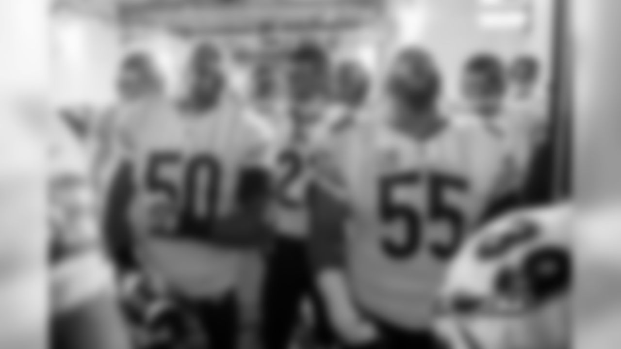 Bears players get fired up as they make their way onto the field.