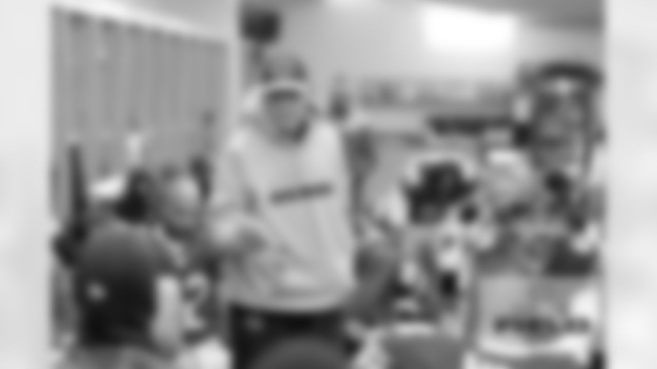 Head coach Marc Trestman addresses the team before the game.