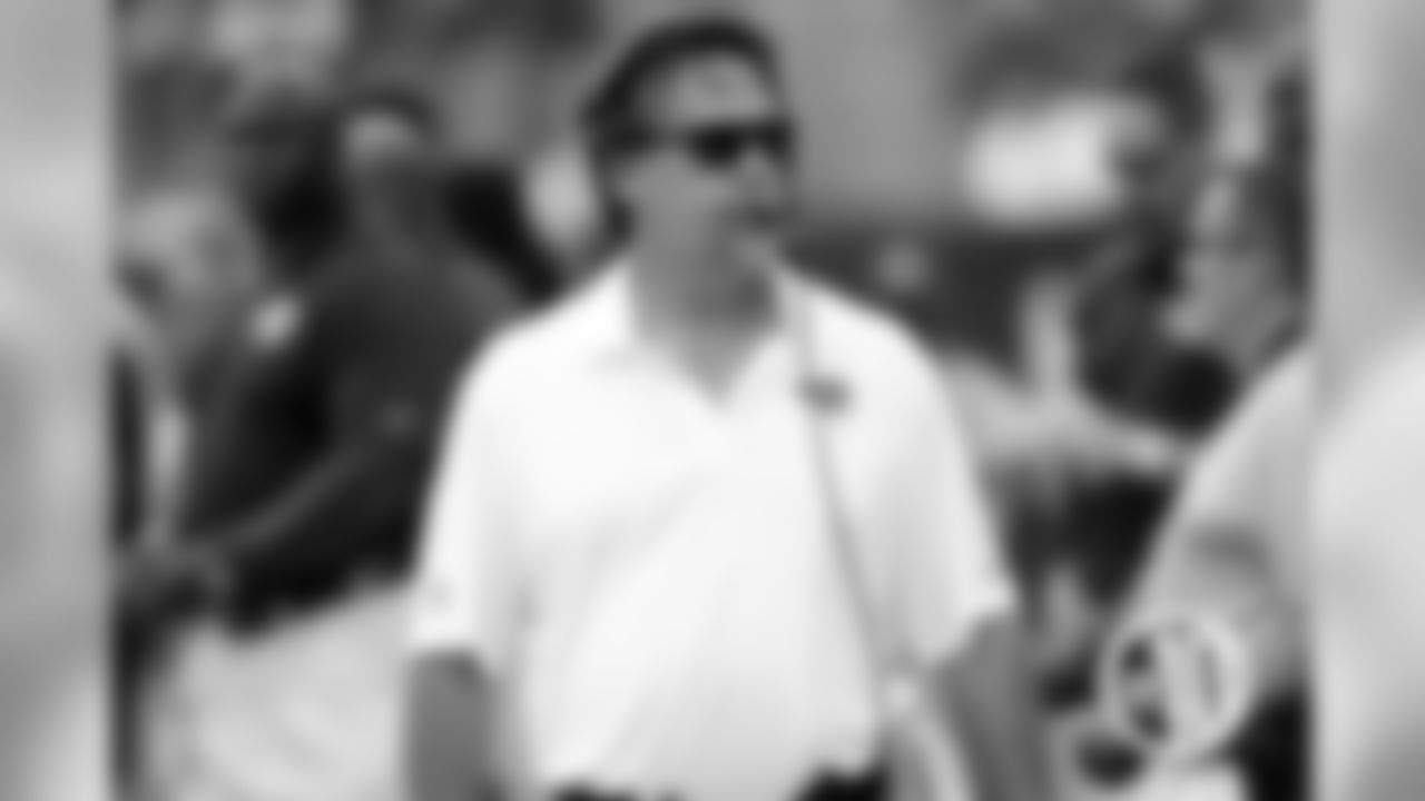Bears playing career: Punt returner and defensive back from 1981-1984. Coaching record: 157-139 (.530) for the Houston Oilers/Tennessee Titans and St. Louis Rams from 1994 through the present.