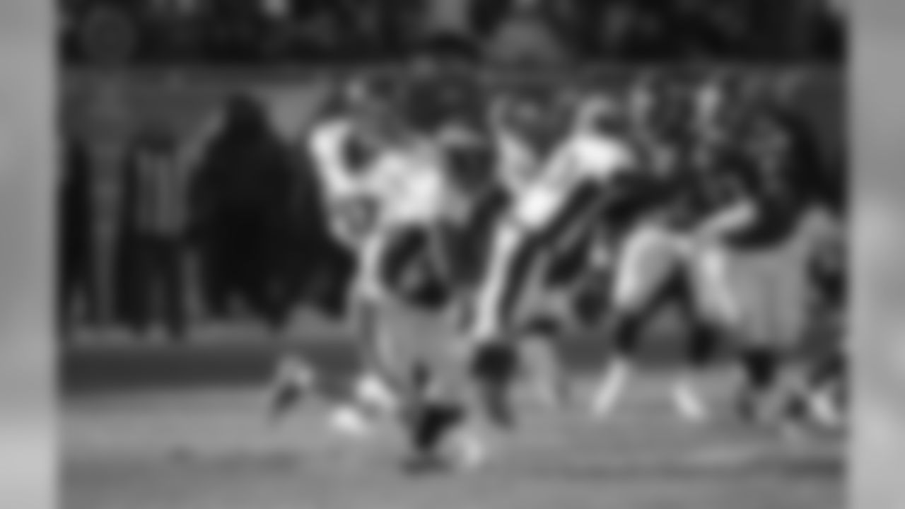 Denver Broncos quarterback Brock Osweiler hands off to running back Ronnie Hillman