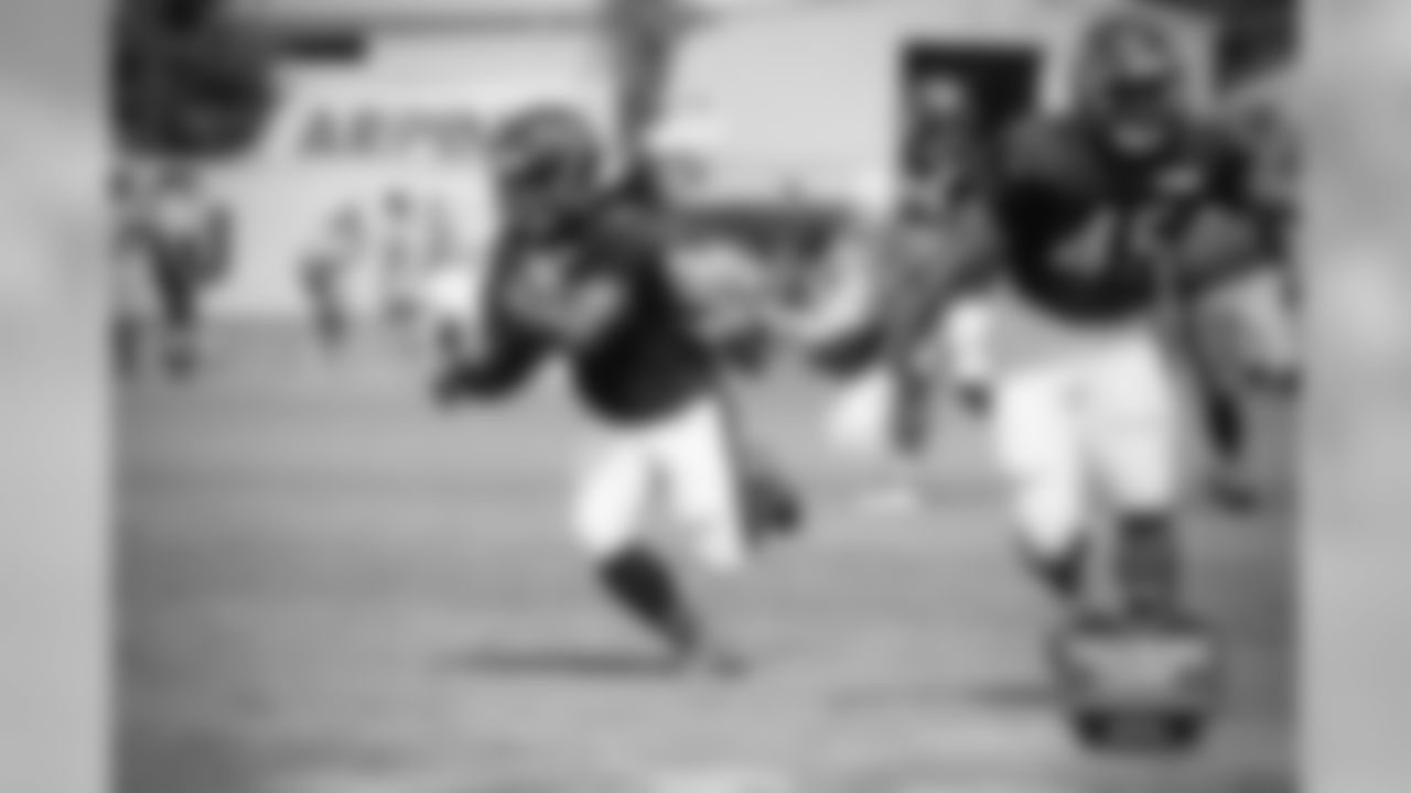 RB Jacquizz Rodgers (35) and FB Darrel Young (45).