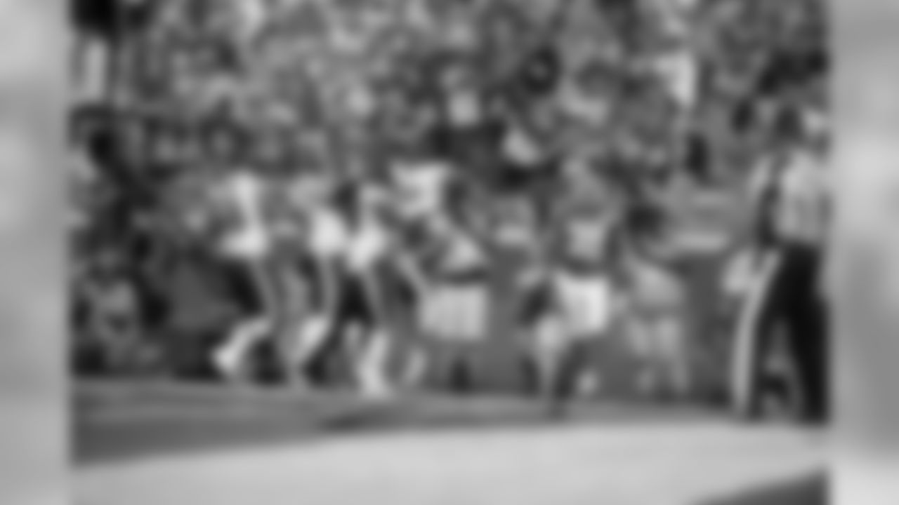 Chicago Bears running back Matt Forte celebrates his game winning touchdown with teammates