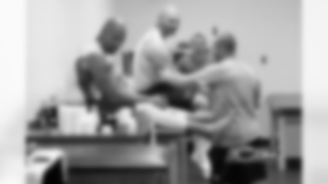 RB Matt Forte and RG Kyle Long getting taped before the game.