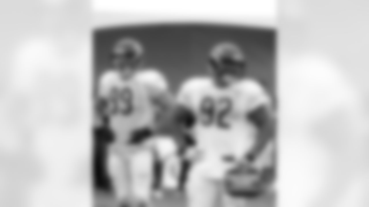 DE Shea McClellin (#99) and DT Stephen Paea (#92)