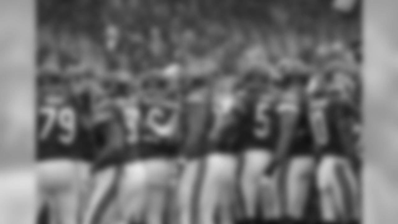 Chicago Bears players huddle before the game.
