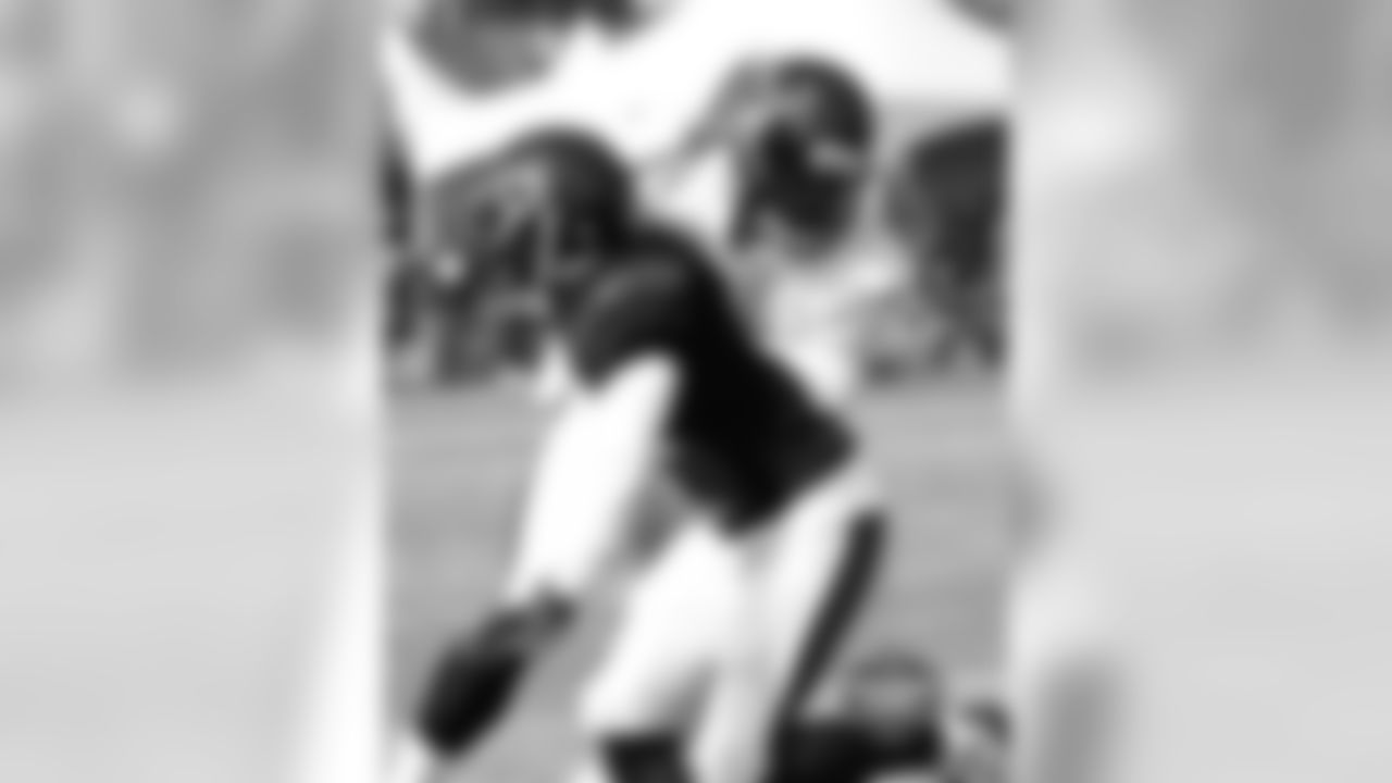 WR Chris Williams (left), DE Cornelius Washington