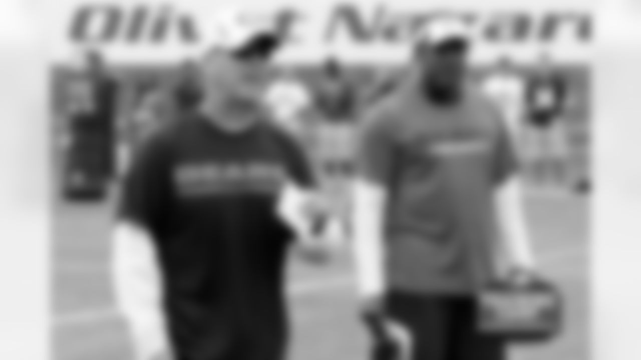 Defensive Line Coach Mike Phair and Defensive Coordinator Mel Tucker