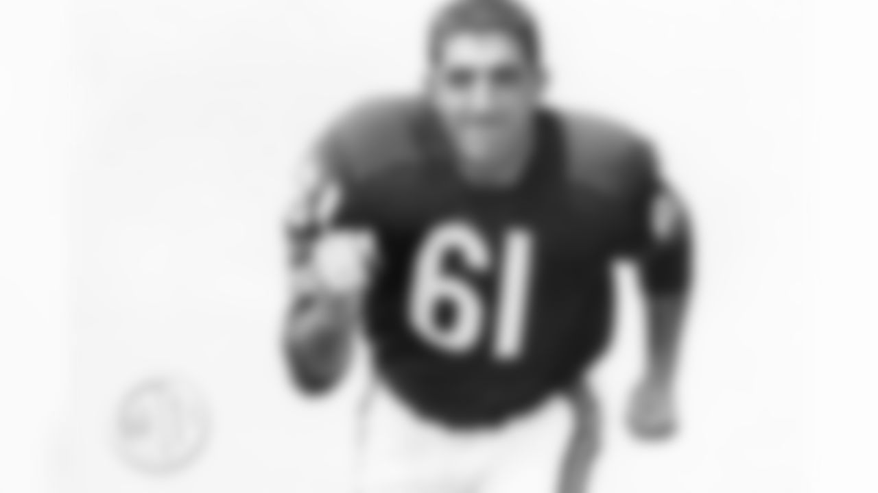 George invented the middle linebacker position by dropping back off the line of scrimmage, but he was also a force against the run during his Hall of Fame career with the Bears from 1952-65.
