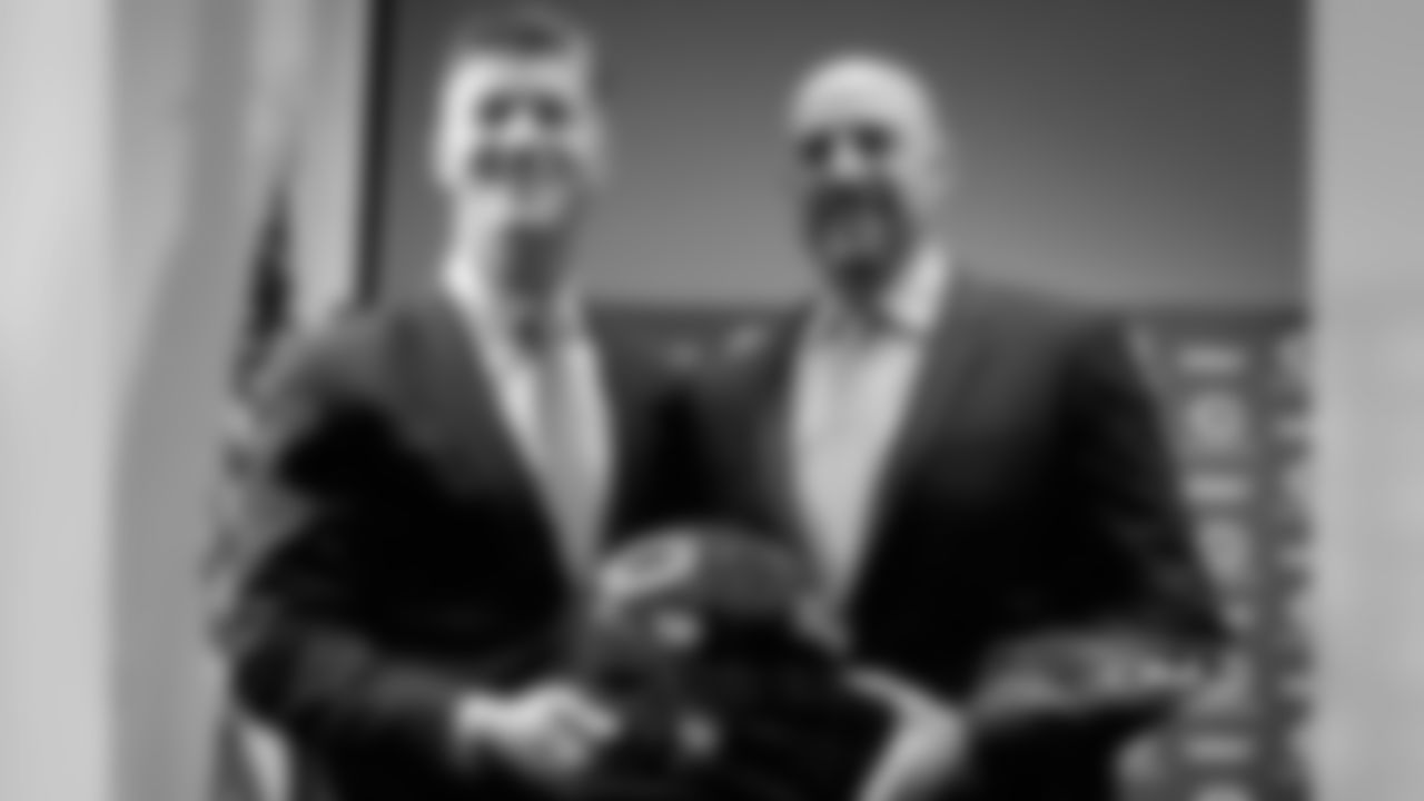 Pace and Nagy hold up a Bears helmet following the press conference.
