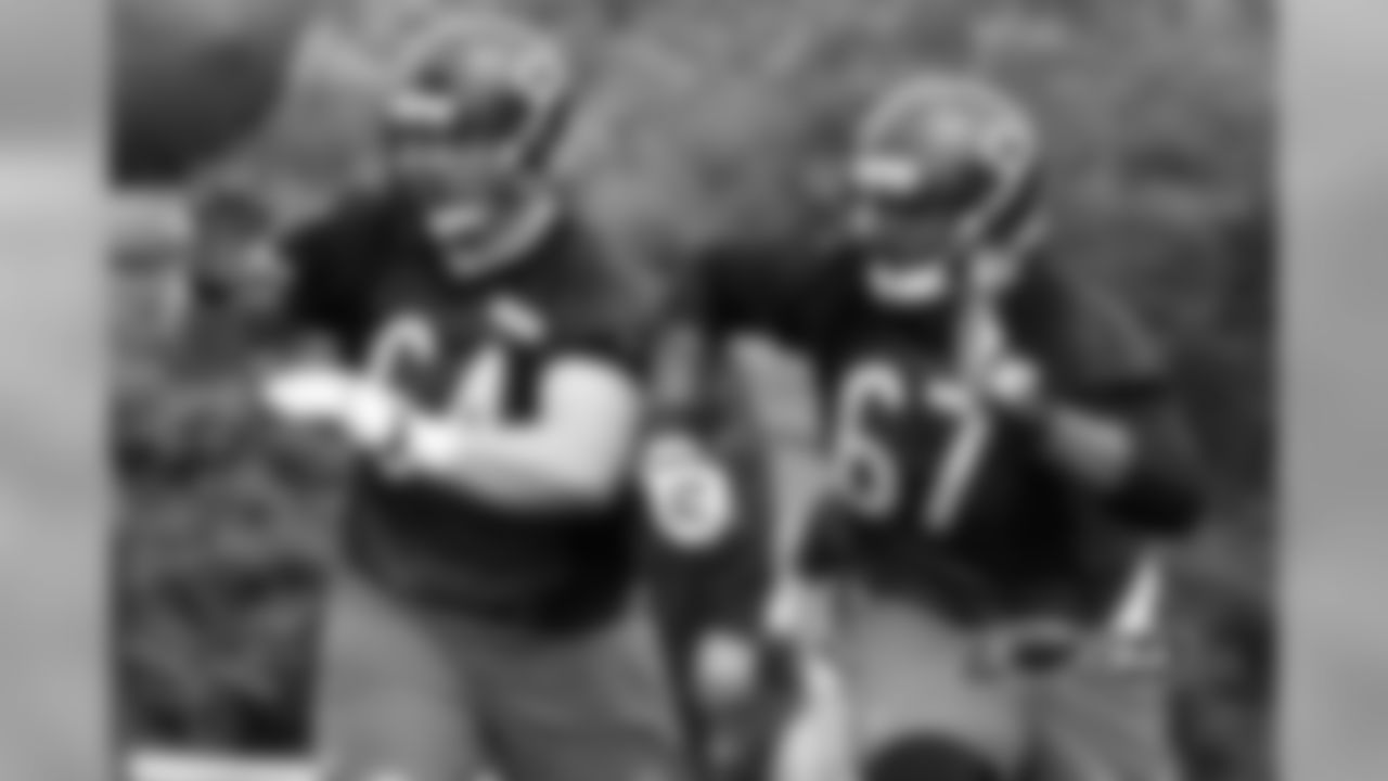 OL Martin Wallace (64) and OL Adrian Bellard (67).