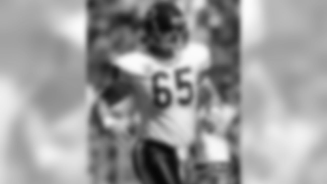 Patrick Mannelly #65 of the Chicago Bears runs against the Detroit Lions at Soldier Field.