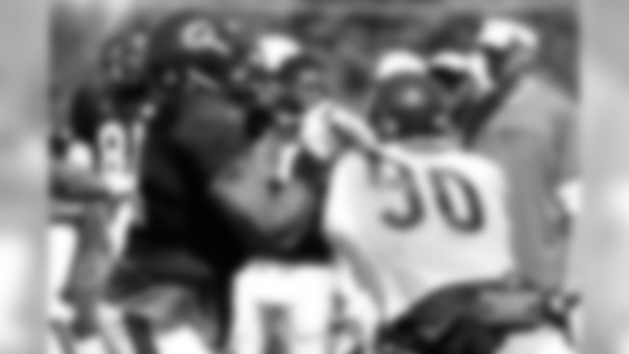 OT J'Marcus Webb (left) keeps DE Julius Peppers (#90) away from QB Jay Cutler.