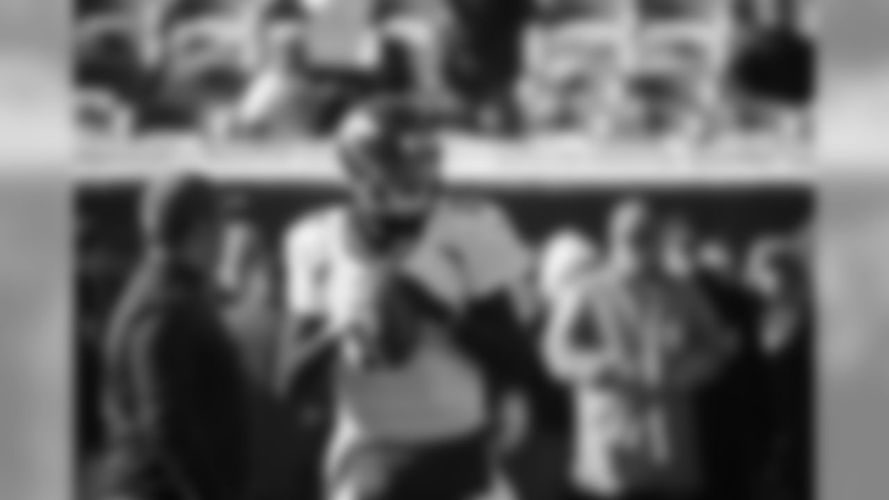 Denver Broncos quarterback Brock Osweiler warms up