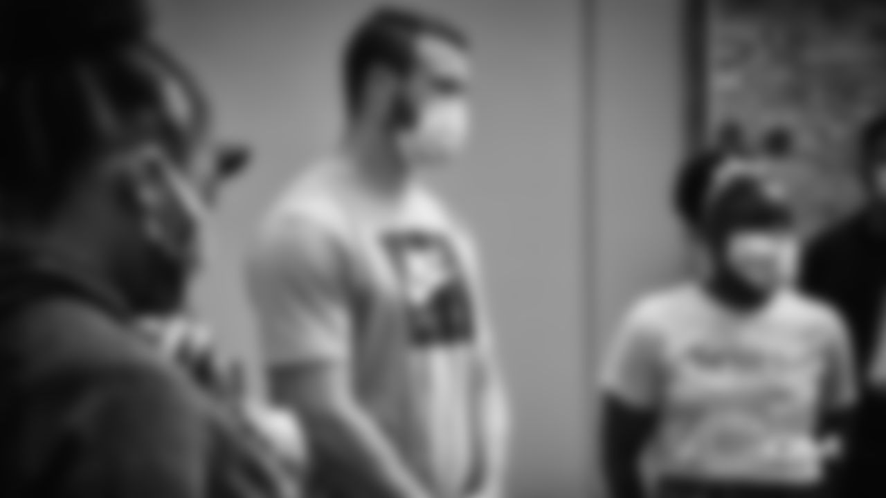 Mitchell Trubisky (Bears) and a youth from By the Hand