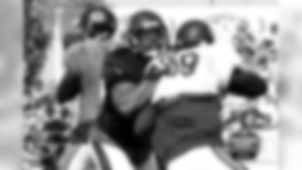 LT Jermon Bushrod keeps DE Jared Allen away from QB Jay Cutler