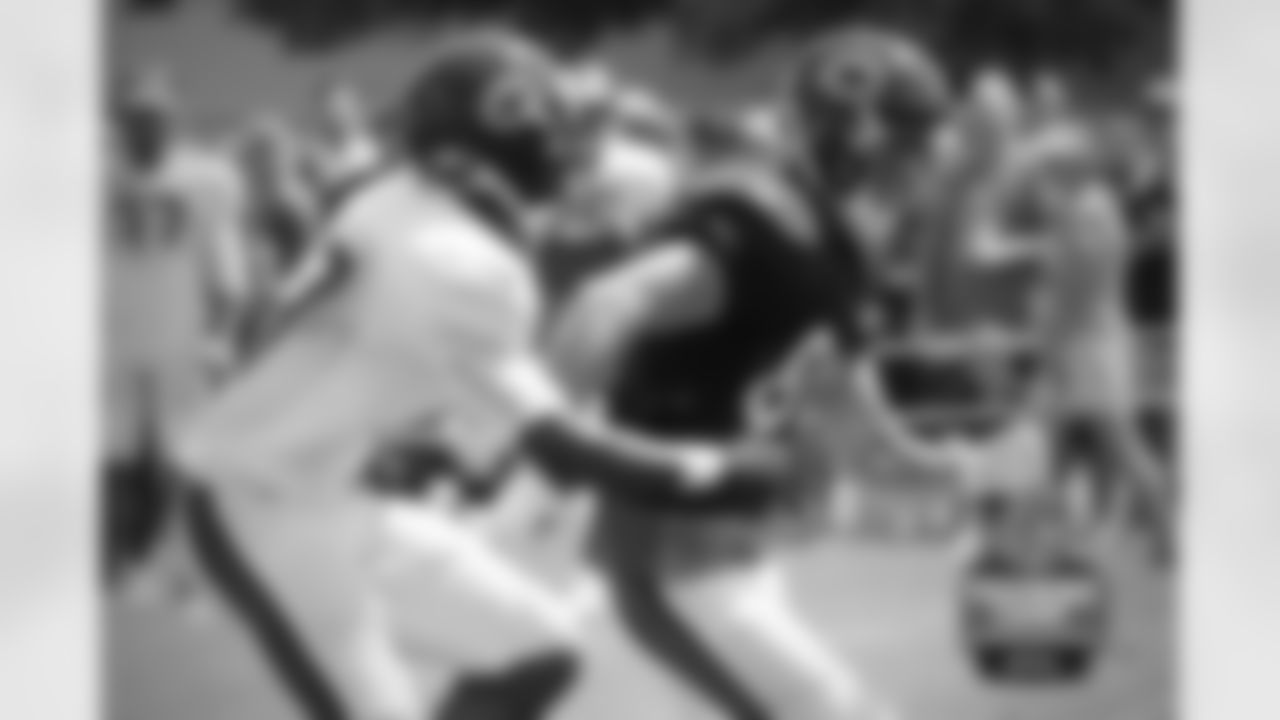 WR Marc Mariani (80) and DB Sherrick McManis (27).