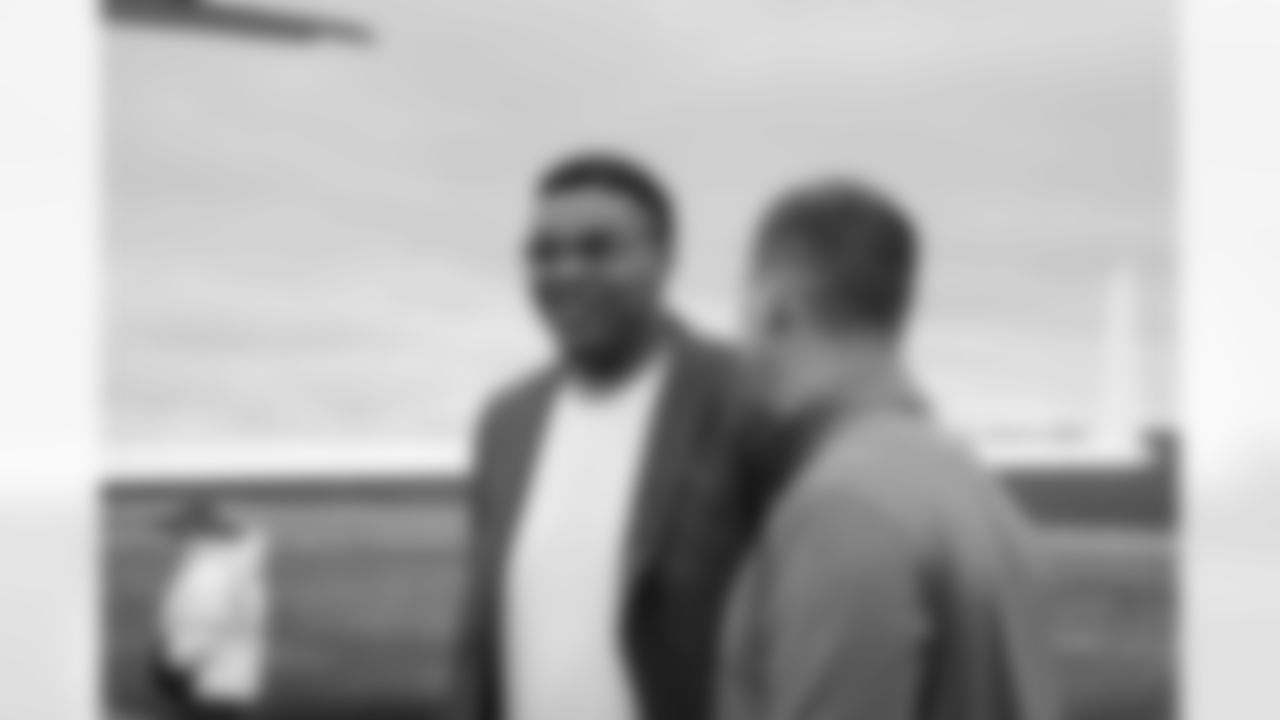 Bengals new free agent signee Orlando Brown Jr. is greeted by Bengals Head Coach Zac Taylor as he arrives in Cincinnati on March 17, 2023.
