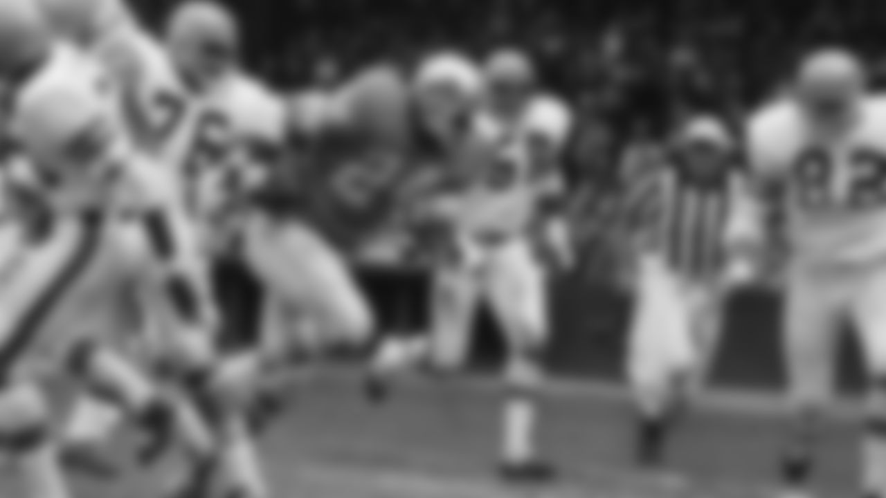 Bengals defenders Frank Cornish (76), Al Beauchamp (58) and Royce Barry (82) converge on Lioins running back Mel Farr in a game on Sunday, Sept. 27, 1970.