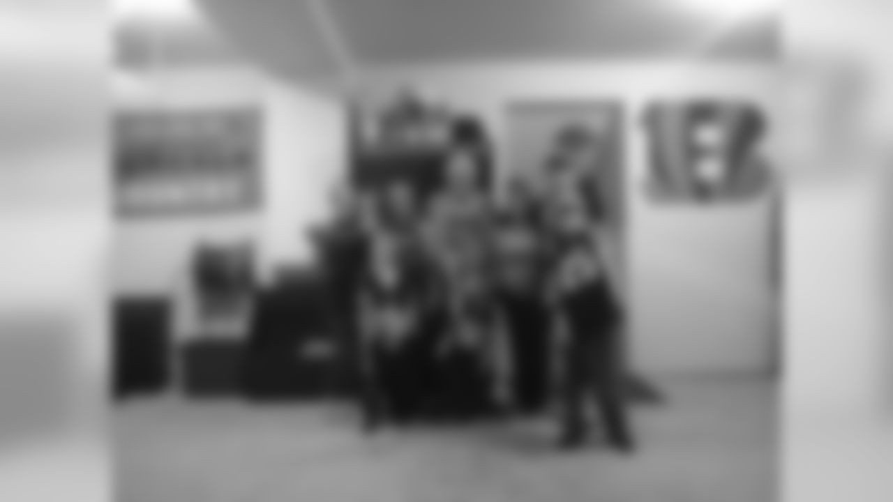 Fans from Canada! My in-laws and family celebrating another Cincy victory in the best decorated garage north of the Border. West Family.. Belle River, ON, Canada