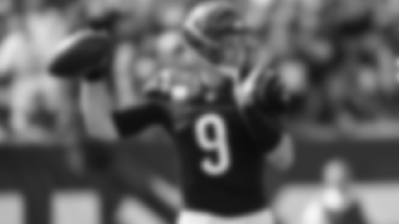 Cincinnati Bengals quarterback Joe Burrow (9) throws against the Green Bay Packers in the first half of an NFL football game in Cincinnati, Sunday, Oct. 10, 2021. (AP Photo/Bryan Woolston)